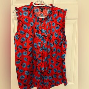 Ann Taylor blouse in red, blue and black, size large.